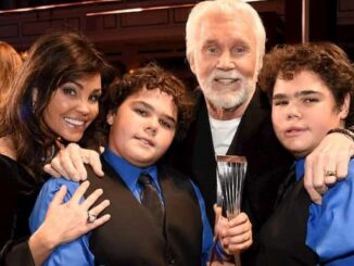 Justin Charles Rogers, his twin brother, and their parents